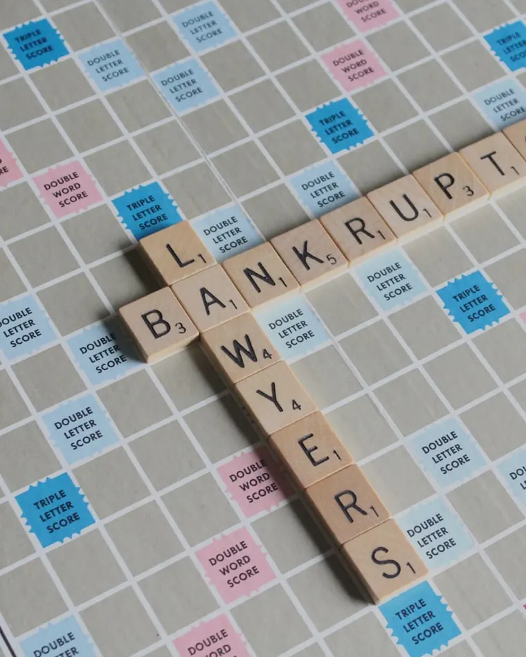A Scrabble board and rack — the tiles a Scrabble word finder turns into scored plays