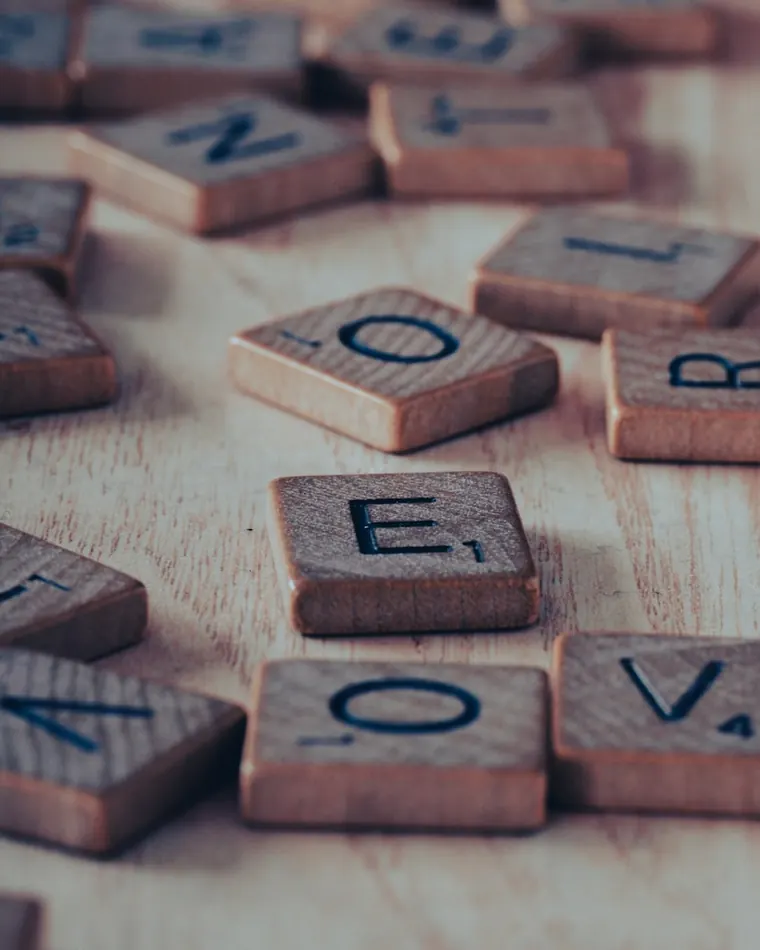 Scrambled letter tiles a Jumble solver rearranges into the answer word